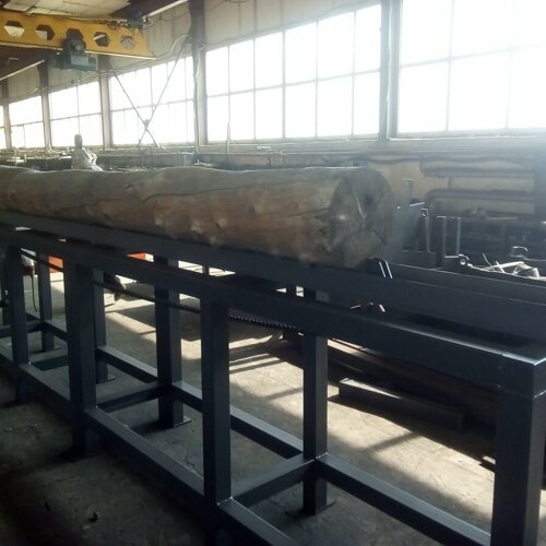 Транспортер продольный для бревен с толкателем