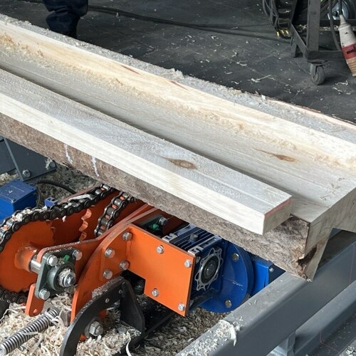 Цепной кантователь бревна